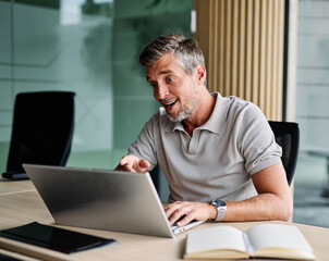 Fototapeta premium Portrait of a young businessman or a young entrepreneur or a student young woman working on tablet or laptop computer working in office