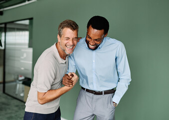 Portrait of two young business man having a meeting or presentation and seminar standing in the office. Portrait of a young businessman talking