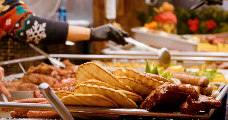 Explore a vibrant display of sausages and various meats perfect for your holiday meals. Experience...