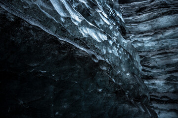 Ice cave in the glacier. Beautiful winter landscape. Toned.