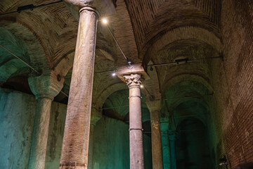 Ancient byzantine basilica cistern with arched ceilings and columns