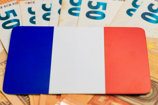 French flag on euros - symbol of economy and currency exchange