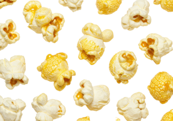Photorealistic close-up of fluffy, distinct popcorn pieces with golden kernels & melted butter, scattered on a transparent background with copy space, classic movie night snack concept