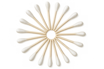 Cotton swabs forming circular pattern on transparent background