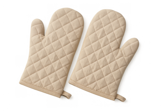 Beige quilted oven mitts protecting hands in kitchen