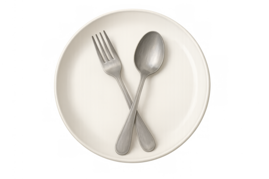 White plate with criss-crossing fork and spoon