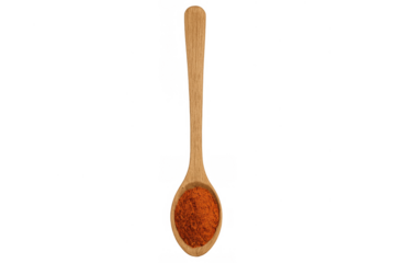 Wooden spoon holding red powder spice on transparent background