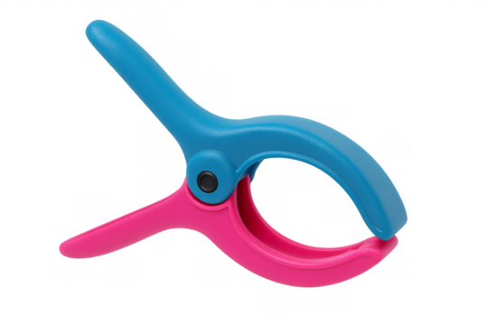 Colorful plastic spring clamp holding object concept