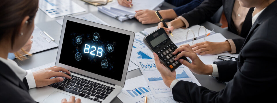 Business person navigates B2B landscape, harness technology to enhance business-to-business connections. Discover reshapes B2B interaction, driving innovation in business-to-businesses strategy. brisk