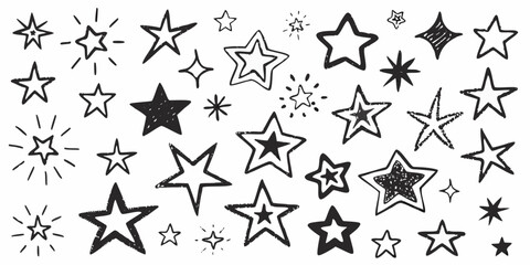 Fototapeta premium Collection of hand drawn doodle stars and sparkles on white background