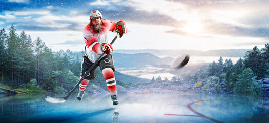 Hockey players in action on the ice. Outdoor game. Sports. Hockey match. A large hockey rink in the middle of an forest. Hockey concept. Panorama