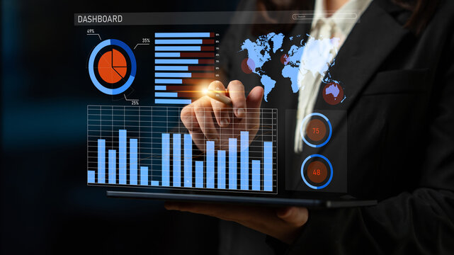 Business professional engages with a digital dashboard, showcasing interactive data visualization with graphs, charts, and a world map for strategic performance analysis. Impute