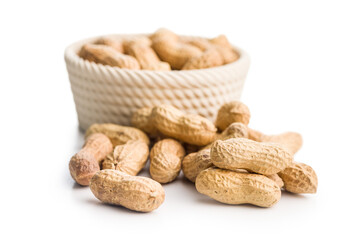 Peanuts in shell. Groundnuts in bowl isolated on white background.