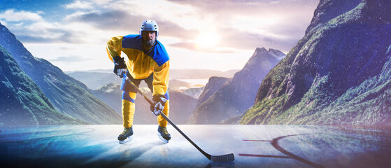 Hockey players in action on the ice. Outdoor game. Sports. Hockey match. A large hockey rink in the middle of an forest. Hockey concept. Panorama