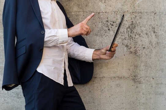 businessman writing on clipboard