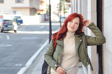 Obraz premium young fashion woman posing on the street