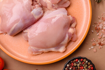 Chicken thigh fillet, skinless and boneless meat for grilling or barbecue. Chicken thigh fillet