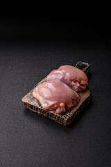 Chicken thigh fillet, skinless and boneless meat for grilling or barbecue. Chicken thigh fillet