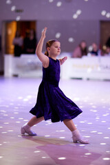 Children participate in ballroom dance competition