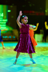 Children compete at ballroom dancing event