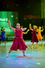 Children compete in dance competition showcasing talent