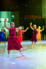 Kids compete in ballroom dance competition event