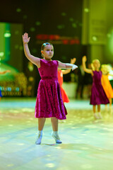 Children compete in ballroom dancing event