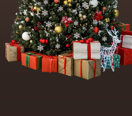 A beautifully decorated Christmas tree and presents near it.