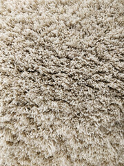 A fluffy beautiful carpet. Copy space. Flat lay, top view.