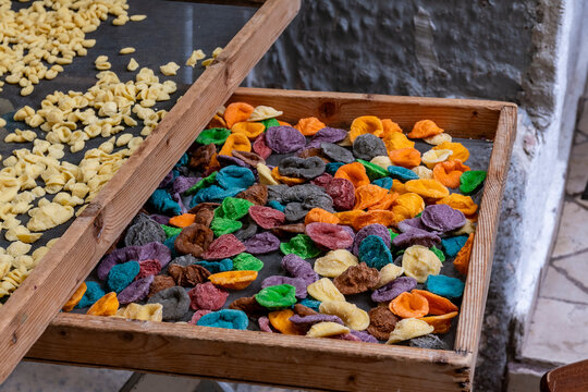 Colorful traditional Apulian "orecchiette" in Strada Arco Basso,  in old Bari