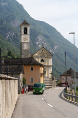 Lavertezzo, Switzerland - August 14, 2025: Beautiful village Lavertezzo and the crystal clear and calm waters of the Verzasca stream. A popular tourist destination in Ticino, Switzerland.