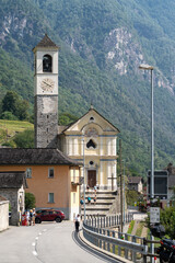 Lavertezzo, Switzerland - August 14, 2025: Beautiful village Lavertezzo and the crystal clear and calm waters of the Verzasca stream. A popular tourist destination in Ticino, Switzerland.