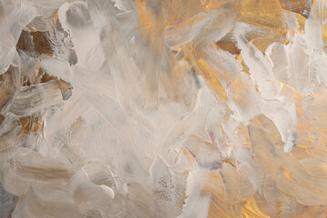 Art oil, acrylic smear blot canvas painting wall. Abstract texture gold, bronze, beige color stain brush stroke texture background.