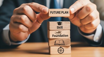 Closeup of a businessman stacking wooden blocks with the words future plan, skill, foundation, and knowledge, symbolizing the importance of planning and education for success