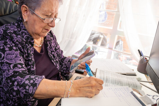 Christian therapist analyzing emotional data for online counseling - Powered by Adobe