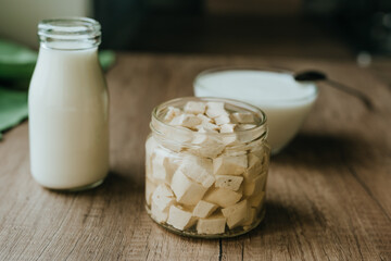 Tofu, Milk and Yogurt on Wooden Surface