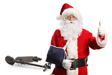 Santa Claus with an arm injury from electric scooter wearing a sling and gesturing thumbs up