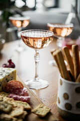 Glasses of rose wine seen during a dinner party of a celebration.