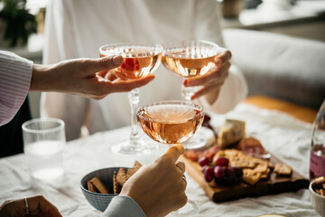 Glasses of rose wine seen during a dinner party of a celebration.