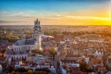 Fotobehang Diepbruin sunset over Bruges Belgium   © Maha