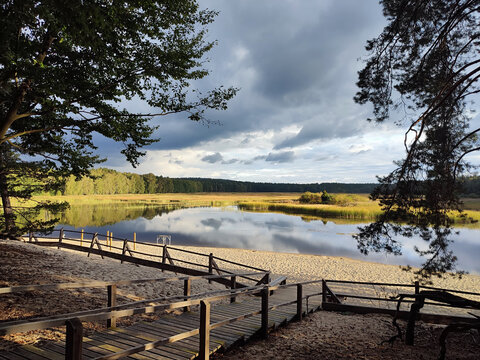 Fall landscape scenery in Roztocze National Park. Beautiful sunset at lake, Poland - Powered by Adobe