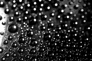 Abstract background texture drops of water and art light on glass. Creative space design