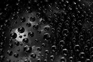 Abstract background texture drops of water and art light on glass. Creative space design