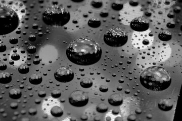 Abstract background texture drops of water and art light on glass. Creative space design