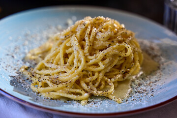 Fresh pasta   spaghetti  carbonara and Aperoat  typical italian resaturant at Trastevere   neighbourhood at Rome 