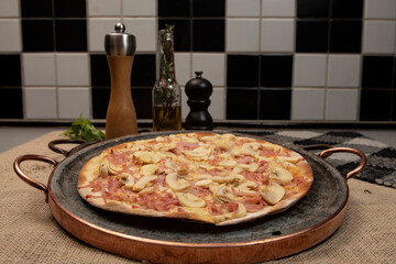 Brazilian pizza with mushroom, cheese and ham