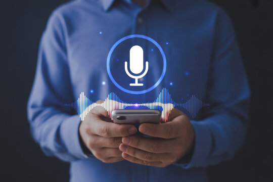 Person holding smartphone with glowing microphone icon and sound wave hologram, symbolizing voice recognition, AI assistant, digital communication, and smart technology innovation in modern devices.