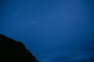 Starry night sky with bright constellations, nature background