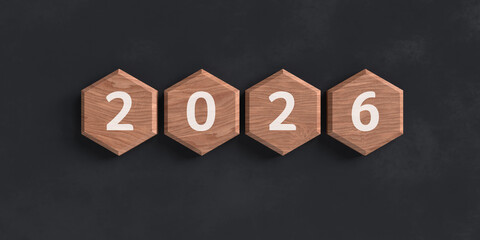 Year 2026 on wooden hexagonal tiles representing future planning and timeline
