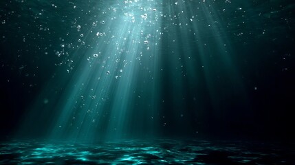 Mysterious sunbeams pierce deep ocean darkness illuminating shimmering water surface and rising bubbles creating an ethereal underwater scene